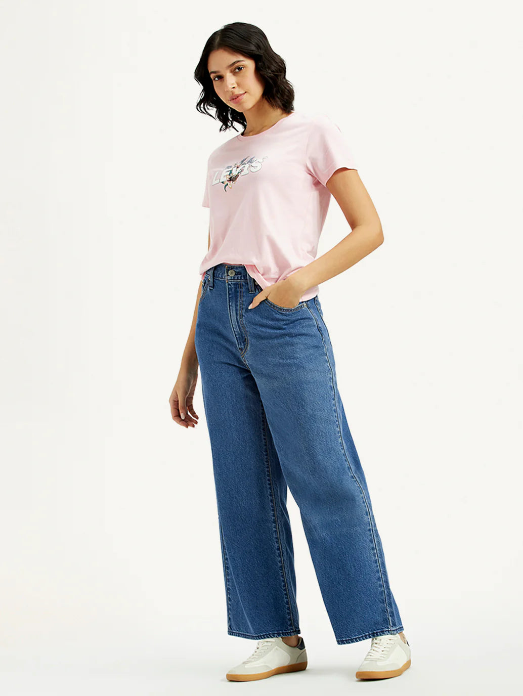 Trendy Medium Indigo Baggy Fit Jeans for Women with Mid-Rise Waist, Cinch Detailing, Soft Durable Fabric, and Modern Streetwear Appeal