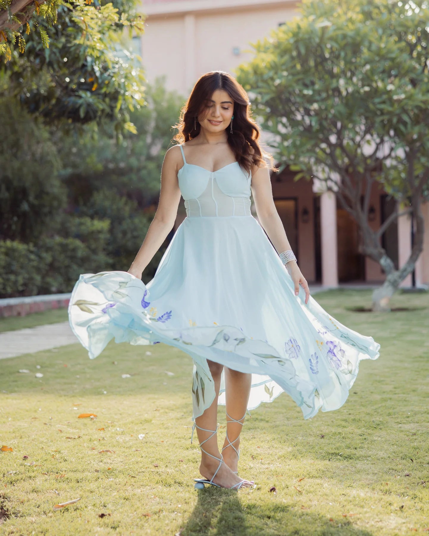 Stylish Blue Handpainted Georgette Dress Highlighting Petal Stroke Patterns, Fluid Fabric Movement, and Fashion-Forward Aesthetic for Modern Wardrobes