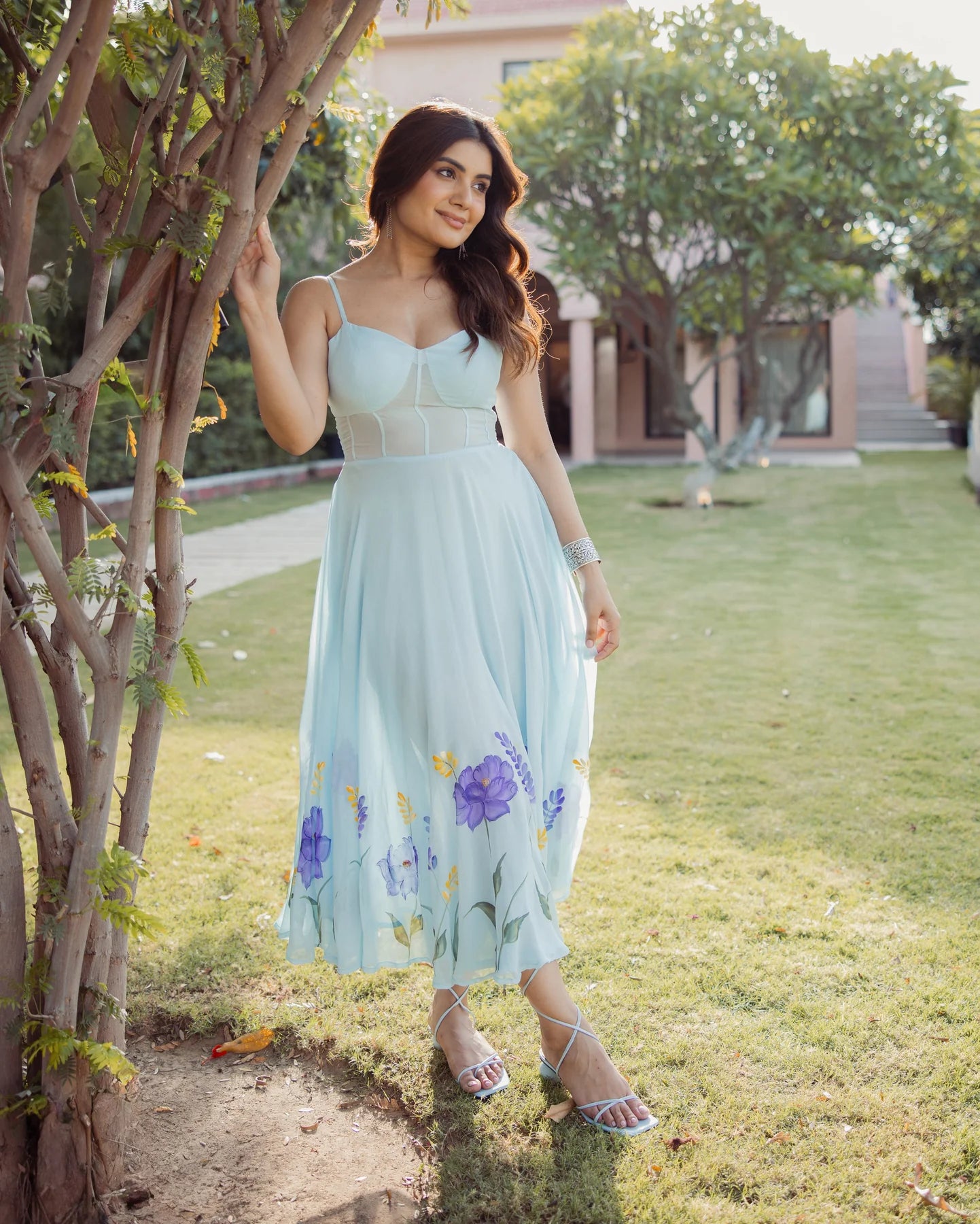 Stylish Blue Handpainted Georgette Dress Highlighting Petal Stroke Patterns, Fluid Fabric Movement, and Fashion-Forward Aesthetic for Modern Wardrobes