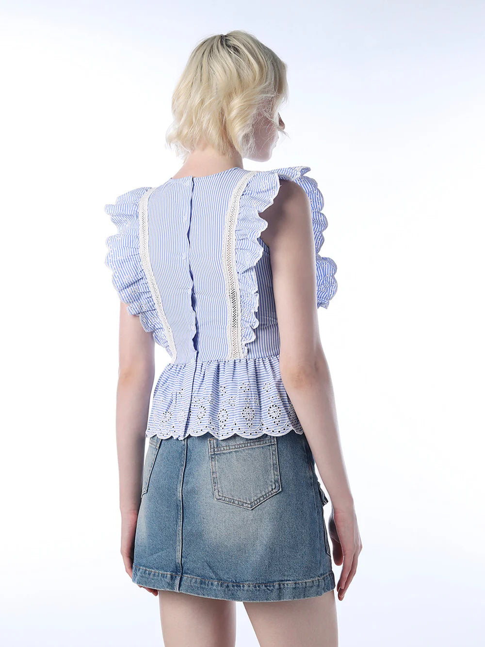 Stylish Women’s Top Featuring Lace Accents and Peplum Silhouette