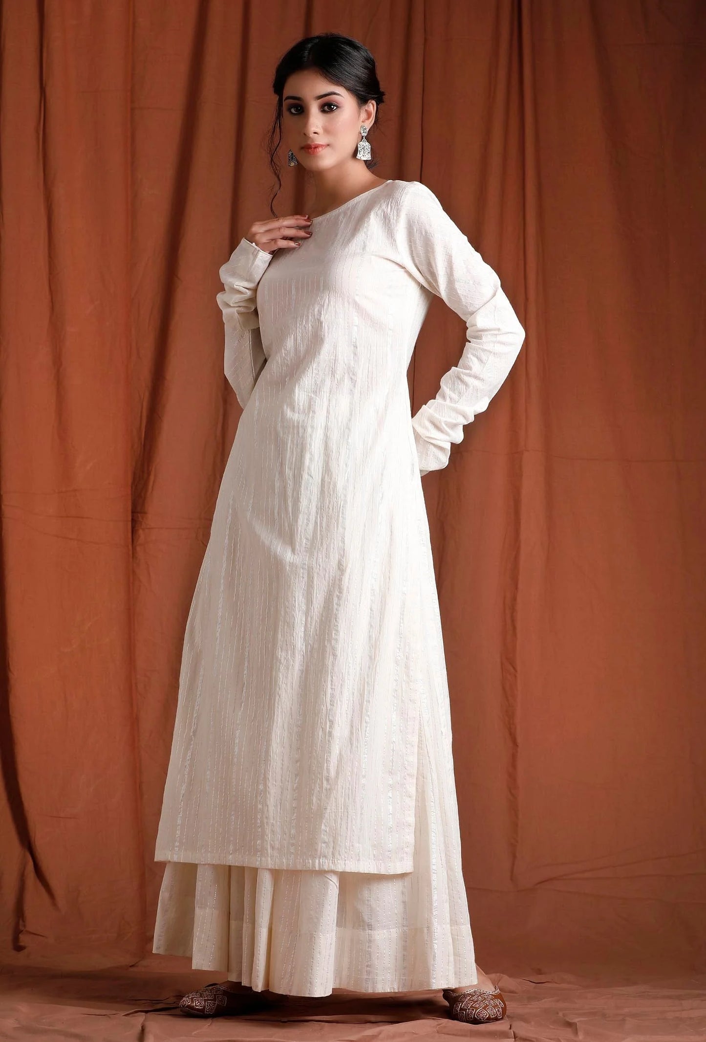 Ethically Sourced Cotton Kurta in a Creamy Off-White Shade, Showcasing a Long Length and Flowy Full Sleeves
