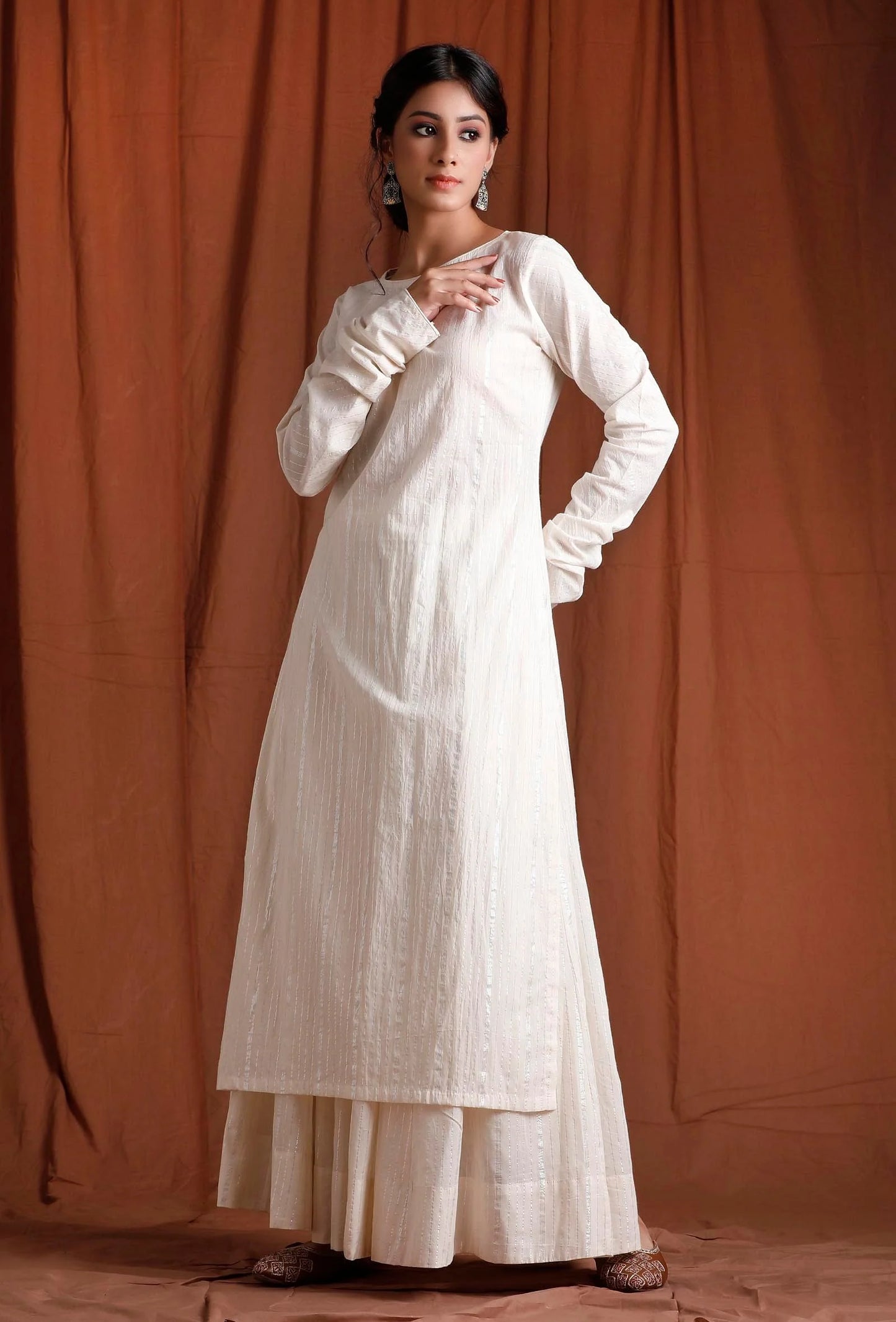 Ethically Sourced Cotton Kurta in a Creamy Off-White Shade, Showcasing a Long Length and Flowy Full Sleeves
