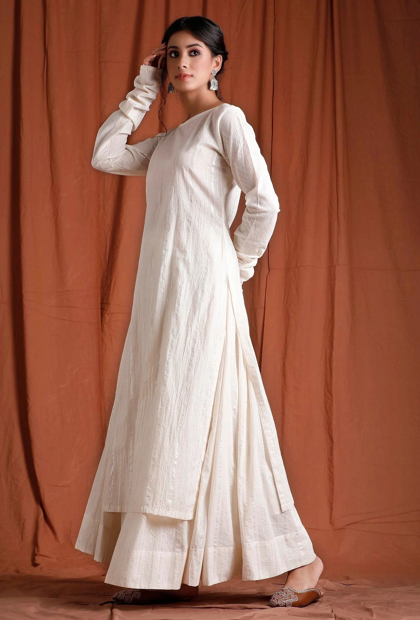 Ethically Sourced Cotton Kurta in a Creamy Off-White Shade, Showcasing a Long Length and Flowy Full Sleeves