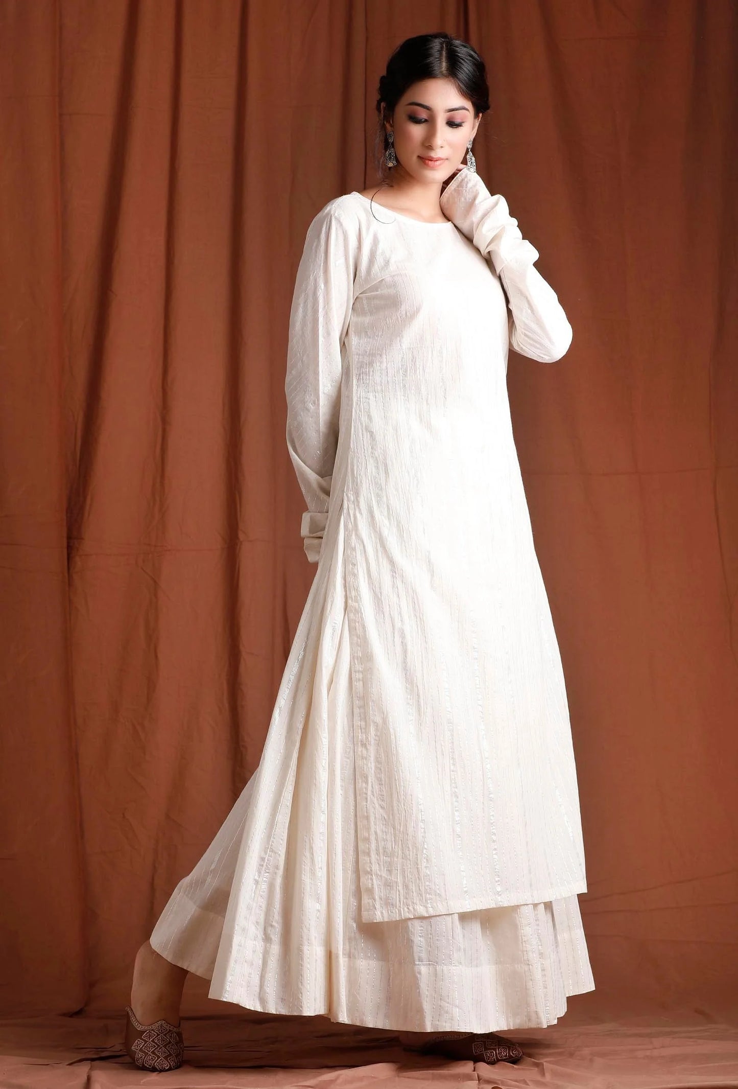 Ethically Sourced Cotton Kurta in a Creamy Off-White Shade, Showcasing a Long Length and Flowy Full Sleeves