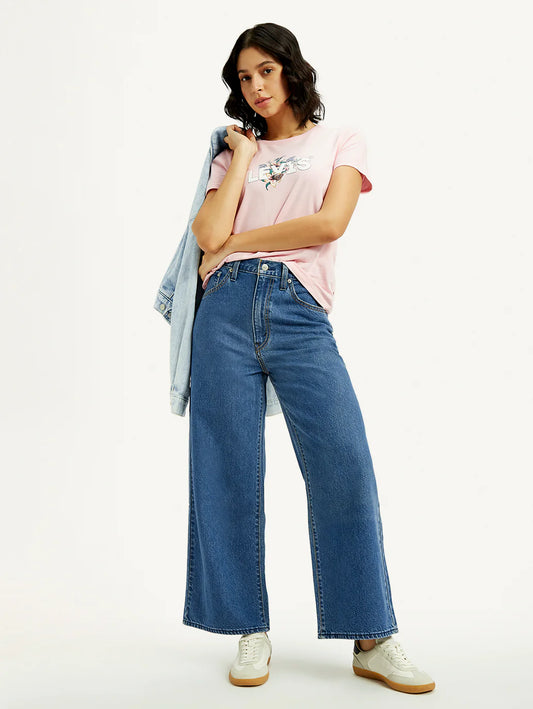 Trendy Medium Indigo Baggy Fit Jeans for Women with Mid-Rise Waist, Cinch Detailing, Soft Durable Fabric, and Modern Streetwear Appeal