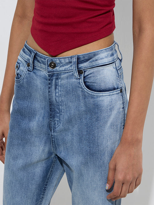 Trendy Blue Faded Bootcut Mid-Rise Jeans for Women Designed with Soft Durable Fabric, Flattering Silhouette, and Effortless Streetwear Appeal