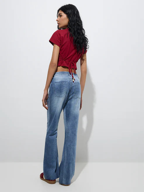 Trendy Blue Faded Bootcut Mid-Rise Jeans for Women Designed with Soft Durable Fabric, Flattering Silhouette, and Effortless Streetwear Appeal