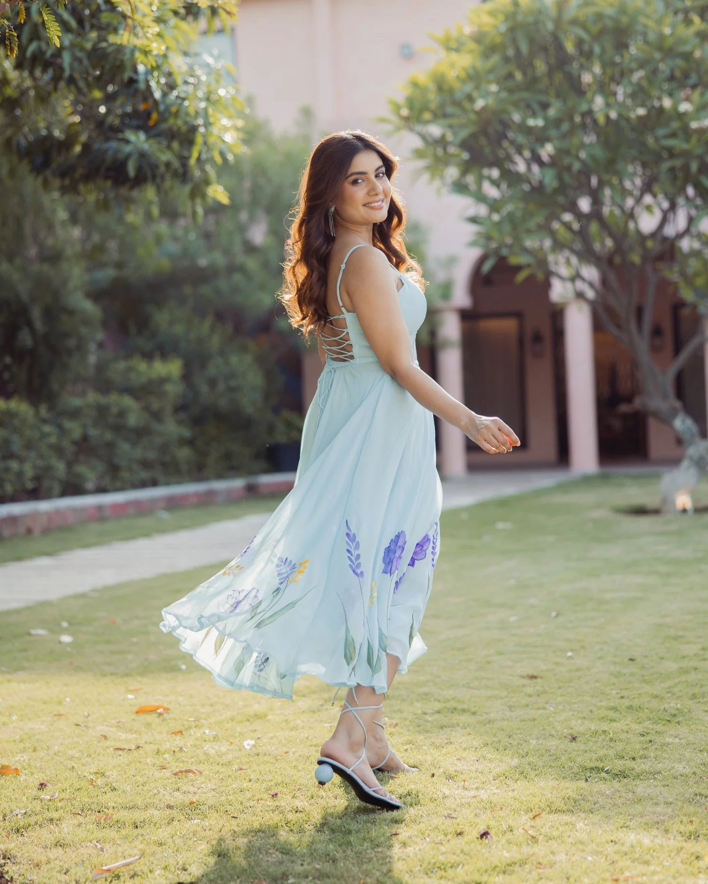Stylish Blue Handpainted Georgette Dress Highlighting Petal Stroke Patterns, Fluid Fabric Movement, and Fashion-Forward Aesthetic for Modern Wardrobes