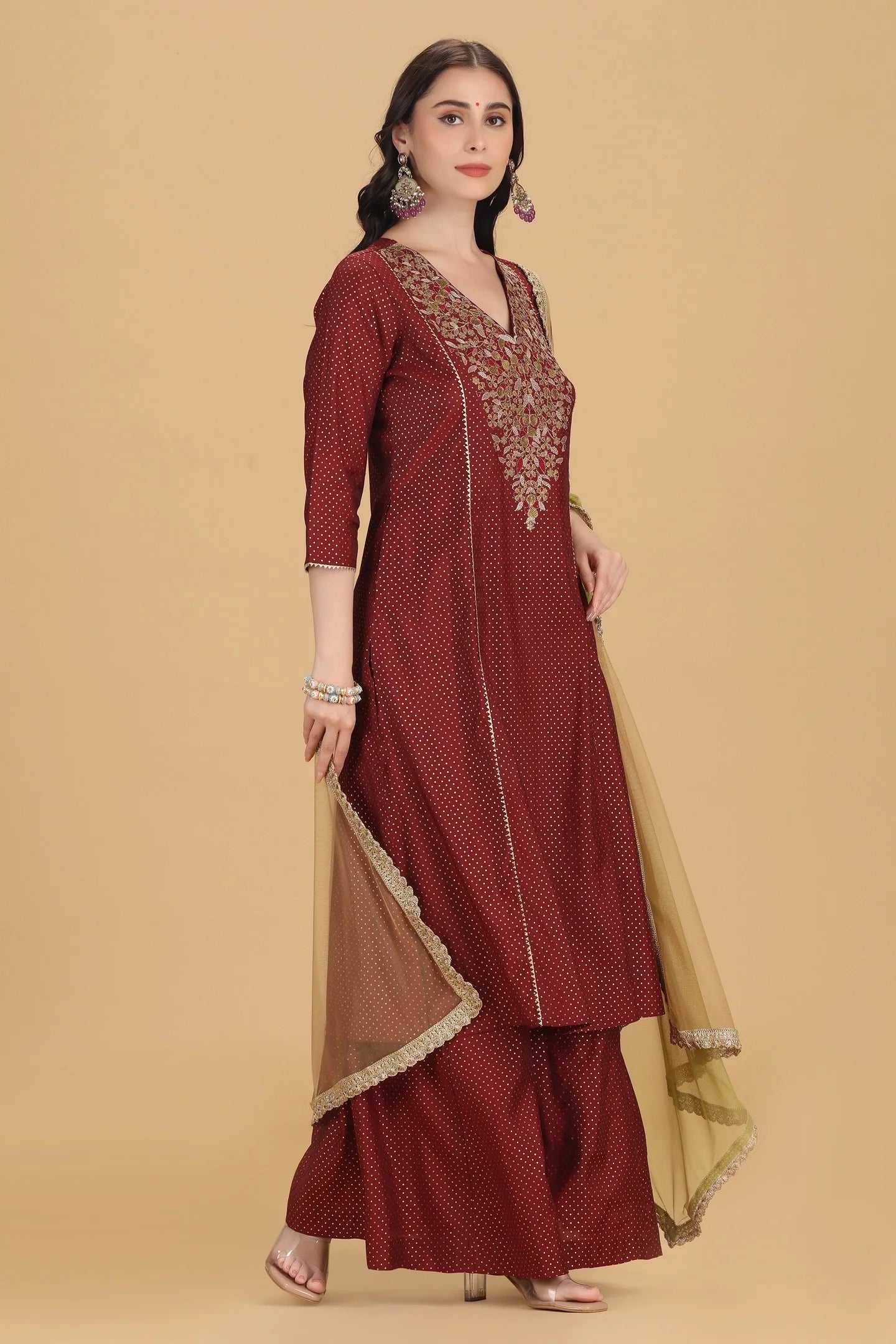 Sophisticated Maroon Roman Silk Kurta Set Featuring Detailed Embroidery on A-Line Silhouette, Matching Palazzo, and Soft Dupatta for Traditional and Contemporary Occasions