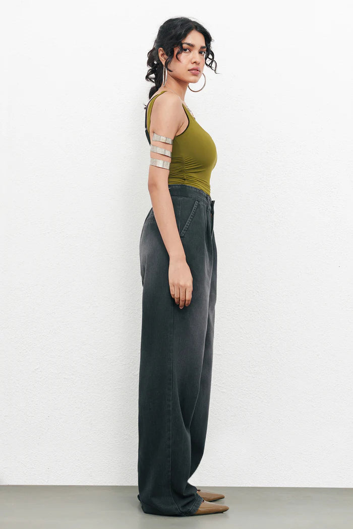 Fashionable Black Ink Fade Pleated Baggy Denim Pants for Women Offering Loose Fit, Soft Comfortable Fabric, and Versatile Urban Outfit Options